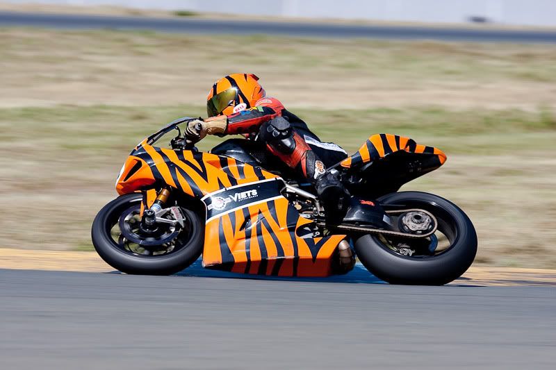 IMAGE: http://i108.photobucket.com/albums/n1/EtherealZee/USA%20April%202010/sears%20point/Searsracing-4.jpg