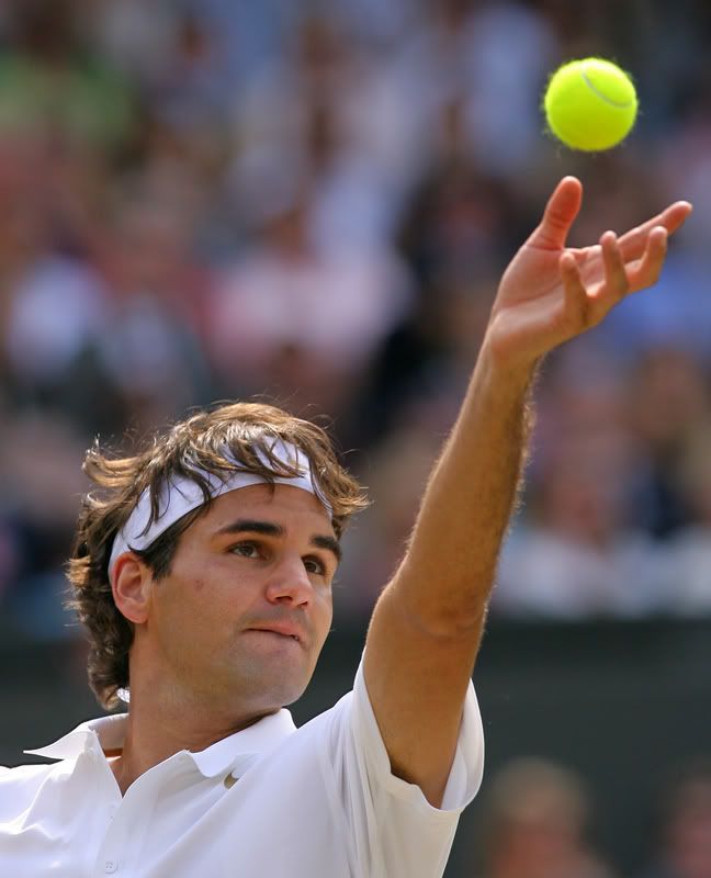 http://sports.yahoo.com/ten/players/42/photos