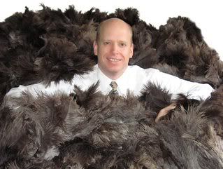 I can think of better ways to pose with ostrich feathers!