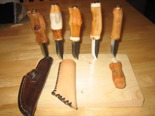 five little knives in wood