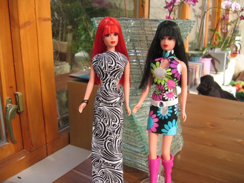these two are both reroots and repaints by the barbie canvas. wearing gwen\'s fab couture! Pictures, Images and Photos