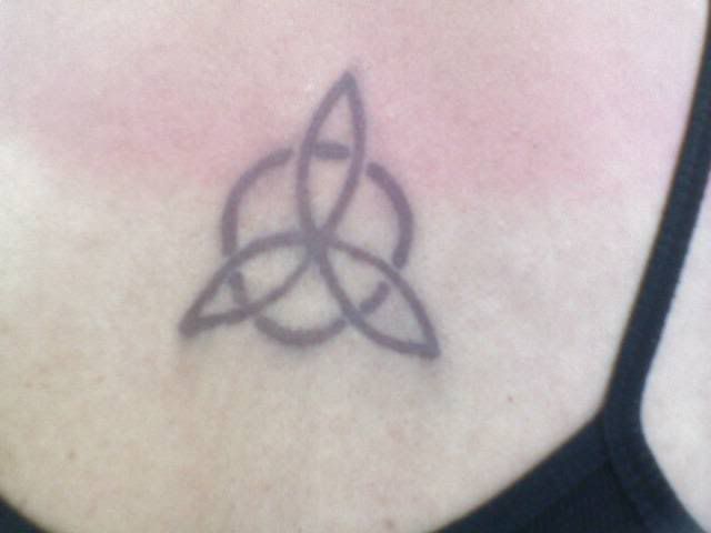 and i have this cool henna tattoo on my back .